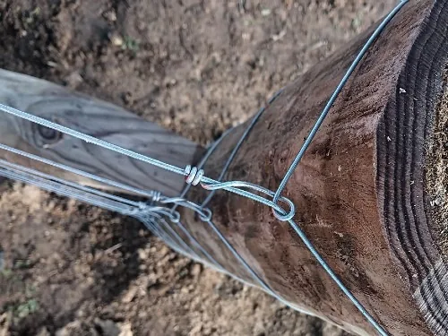Electric fence strainer post detail